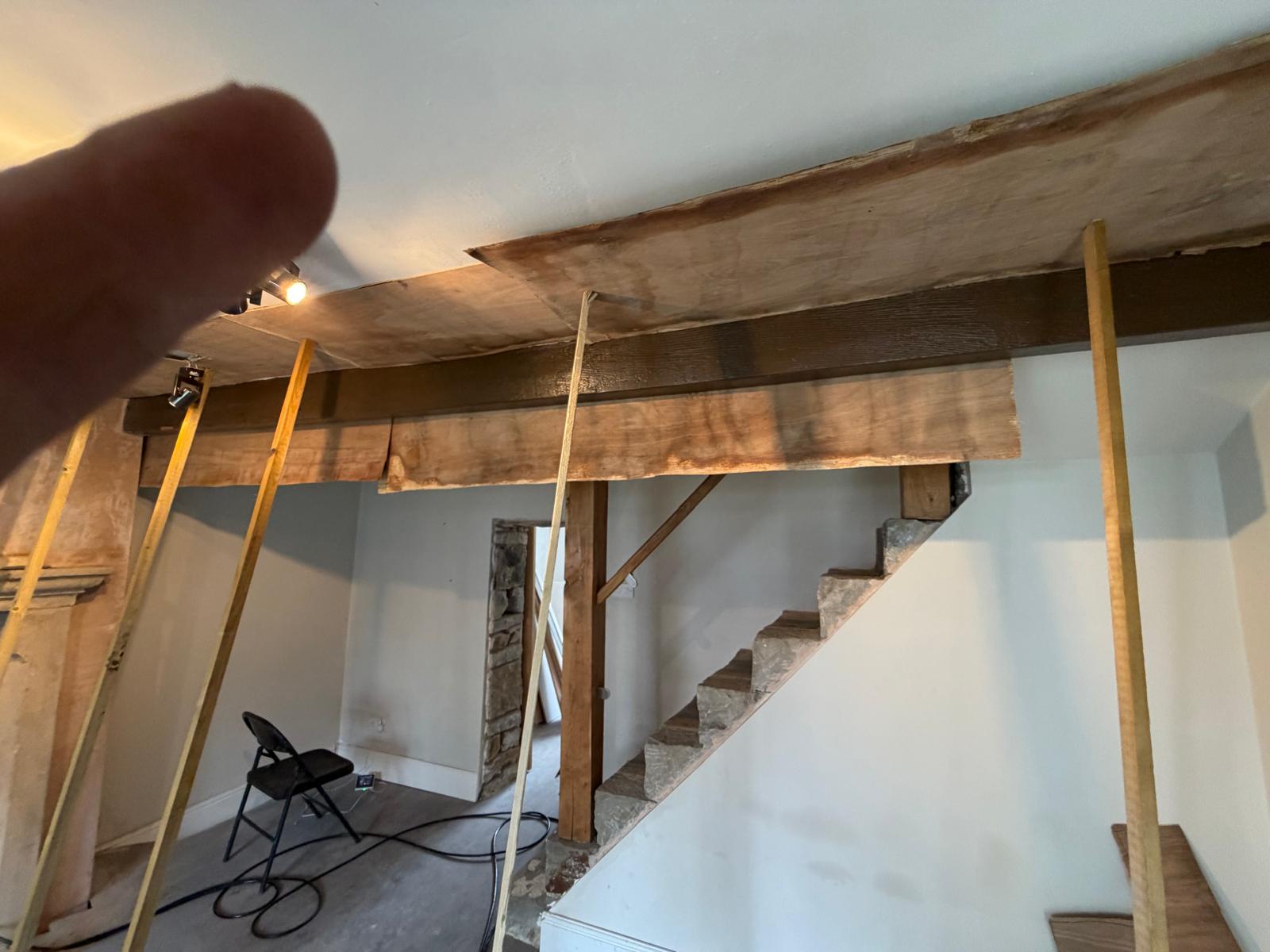 Ceiling beams and staircase framework during clean-down