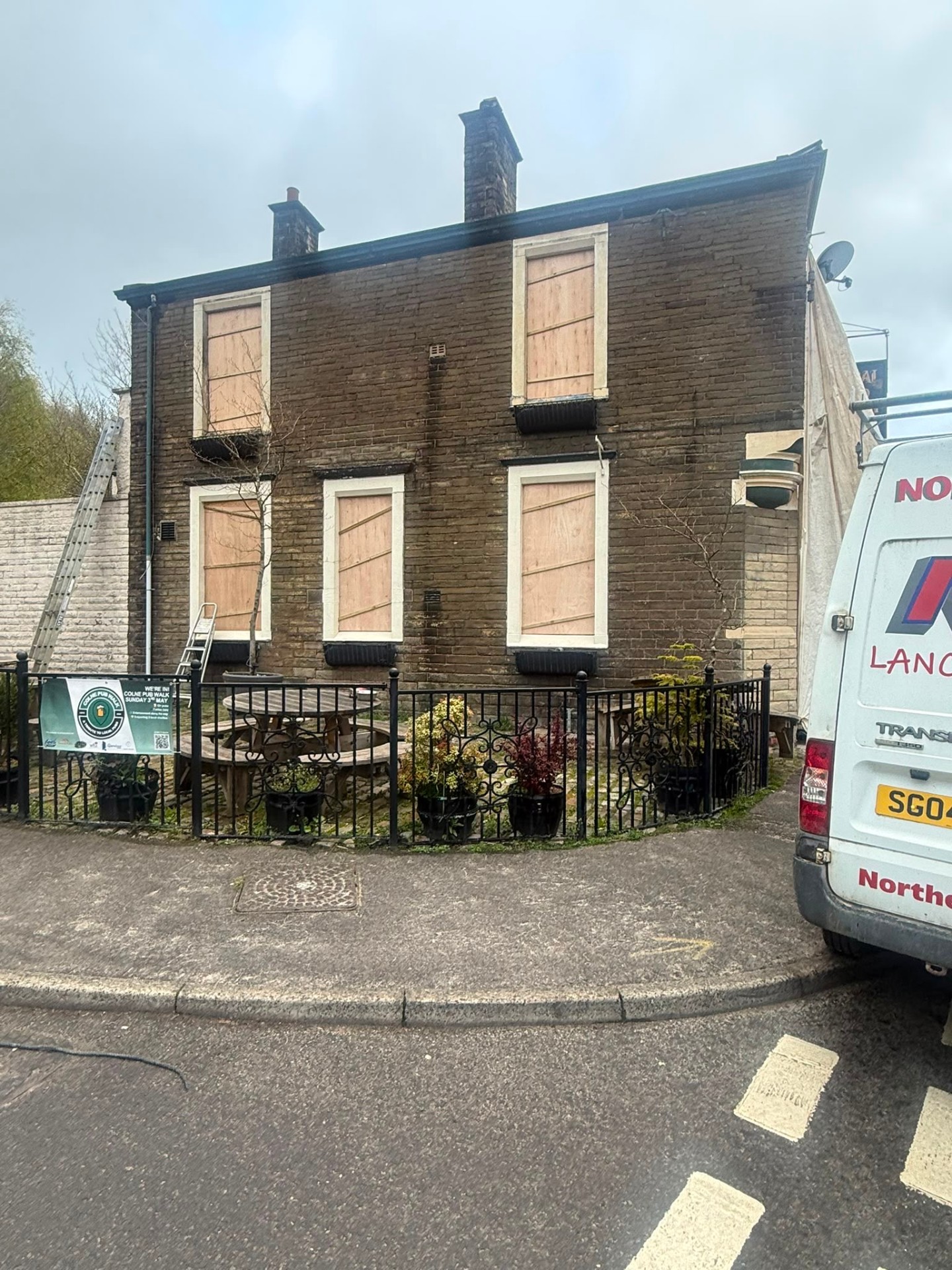 Before — soot-stained facade